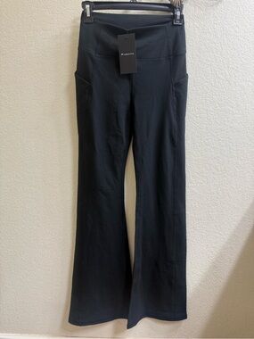 Fabletics Black High-Rise Flare Leggings with Side Pockets